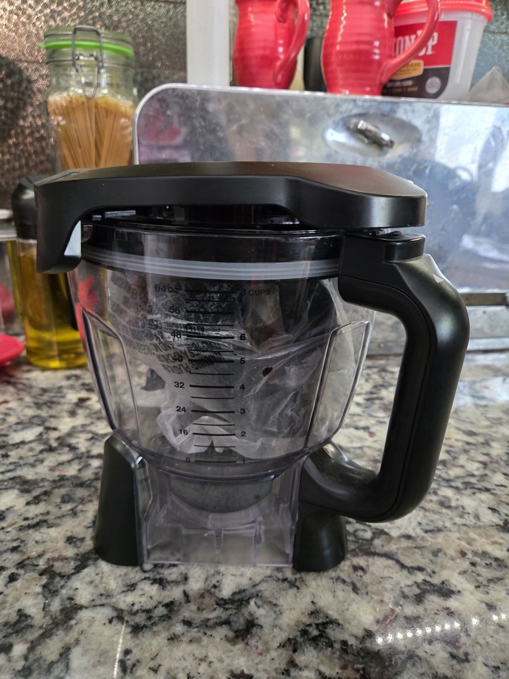 Black Multi-Purpose Kitchen Measuring Pitcher and Pouring Lid